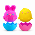 Pink bunny and yellow chick squishies with blue and pink egg shells