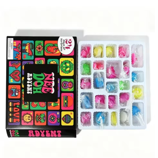 NeeDoh Advent calendar box next to its tray of surprises