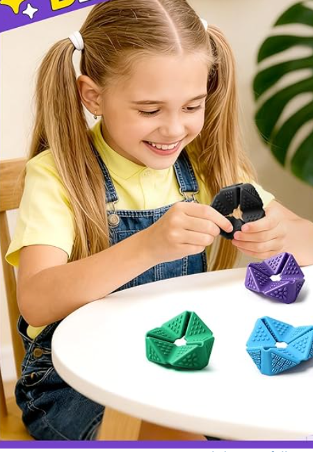 Playing with the flip fidgets at a table