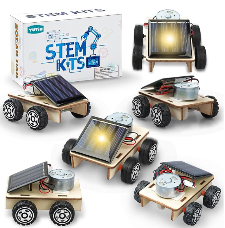 Six wooden solar cars with the STEM Kits box