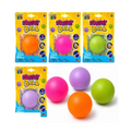 Four Play Hub Squishy Balls in orange, pink, green and purple with their packaging